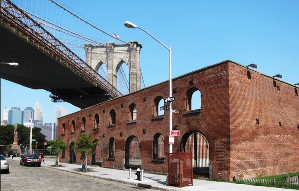 Historic brick Tobacco Warehouse under the Brooklyn Bridge in DUMBO