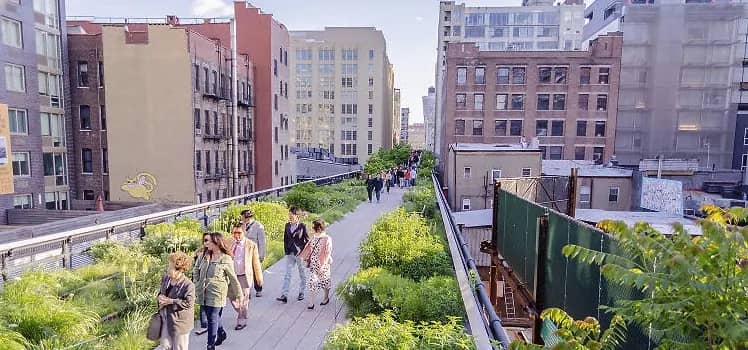 Visitors walking the High Line elevated park in New York City